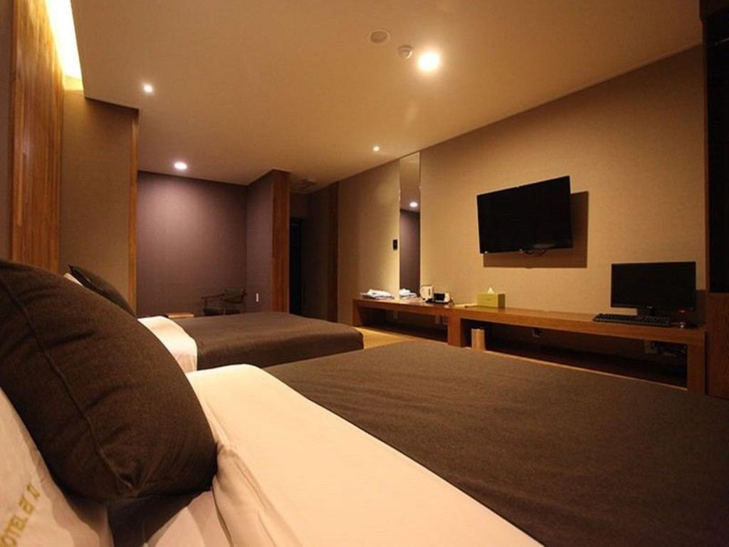 Hotel Rich Коян Номер фото